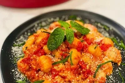 CHEESY BAKED GNOCCHI WITH A ROASTED GARLIC TOMATO SAUCE