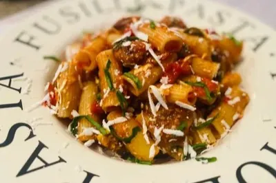 RIGATONI WITH SAUSAGE, EGGPLANT, TOMATOES, BASIL & RICOTTA SALATA