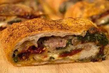 Sausage, Rabe & Sun-Dried Pepper Calzone